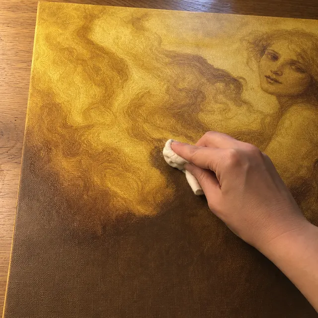 Wiping out glowing highlights from wet oil paint with a rag